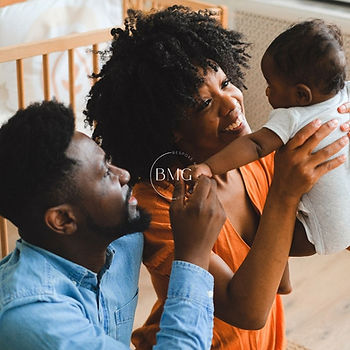 Parenting holding their baby.