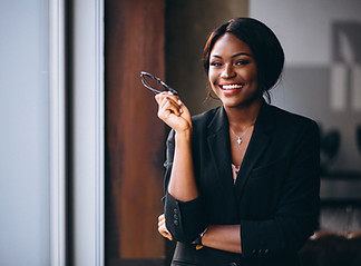 african-american-business-woman-by-window.jpg