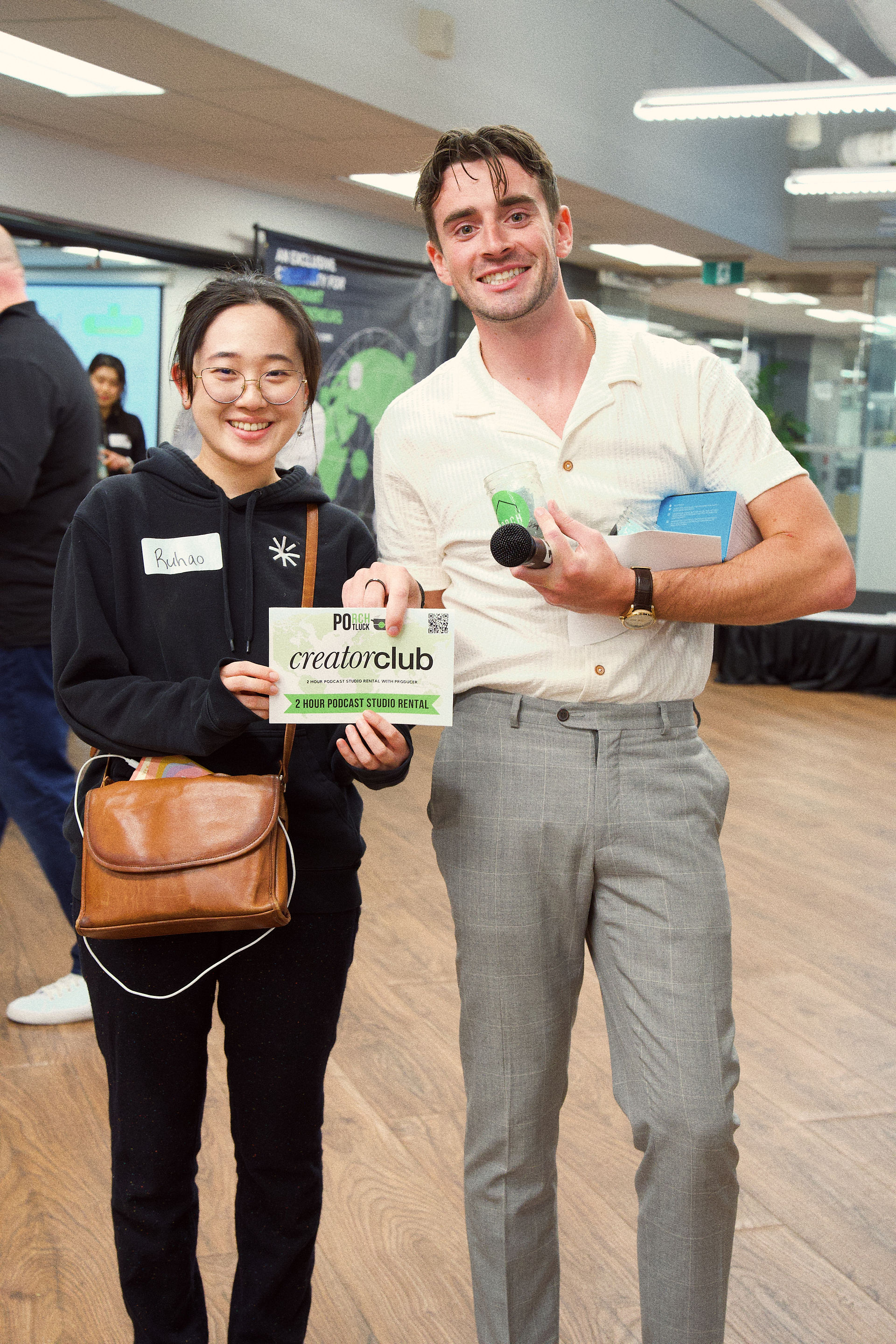 PORCH Potluck handing Creator Club prize to international entrepreneur