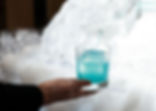 Icebreaker electrolyte and gatorade-inspired drink with blue curacao, served from an ice luge.