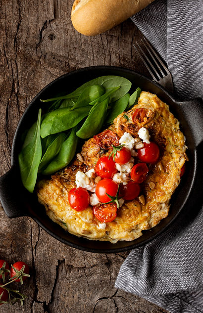 top-view-omelette-with-cherry-tomatoes.jpg