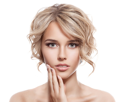 beauty and health concept - profile portrait of smiling young woman.jpg