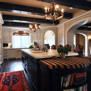 Brick Chateau by James McNeal, Principal Architect at JMAD - James McNeal Architecture & Design. Creative architecture firm specializing in enduring artistry & high-end luxury commercial & residential design. Dream home, luxury house design, custom homes, luxury lifestyle, mansion, boss homes, stunning exterior with curb appeal. Super detailed, artistic, sophisticated, Eclectic chateau style with French Romanesque and islamic arches inside and out, Traditional castle, compartmentalized, brick exterior, Groin vaults, articulated plaster details in the ceilings, Arched entryway stone surround wood beam ceilings home bar, Circular stairs with a landing mid-way that has access to a French balcony wood beam ceiling kitchen custom hood kitchen island custom cabinets