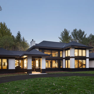 Zen Modern Retreat by JMAD - James McNeal Architecture and Design. Architecture firm specializing in high-end residential design, luxury homes, and creative enduring artistry. Architecture firm near me. Dream home, dream house, luxury design, luxury lifestyle. Custom homes, interior design, luxury real estate, residential architecture, home architects, home architecture. Asian modern style home, modern home design, modern architecture, asian style home. Home entrance, front door, modern home in the woods, luxury homes, outdoor living space, patio, covered outdoor living space.