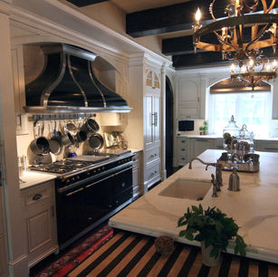 Brick Chateau by James McNeal, Principal Architect at JMAD - James McNeal Architecture & Design. Creative architecture firm specializing in enduring artistry & high-end luxury commercial & residential design. Dream home, luxury house design, custom homes, luxury lifestyle, mansion, boss homes, stunning exterior with curb appeal. Super detailed, artistic, sophisticated, Eclectic chateau style with French Romanesque and islamic arches inside and out, Traditional castle, compartmentalized, brick exterior, Groin vaults, articulated plaster details in the ceilings, Arched entryway stone surround wood beam ceilings home bar, Circular stairs with a landing mid-way that has access to a French balcony