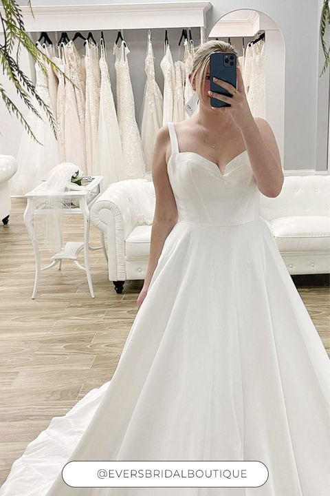 Woman wearing minimalistic mikado ballgown