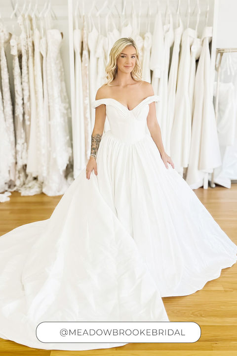 Blonde bride wearing beautiful mikado ballgown.