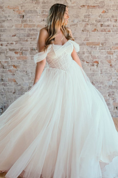 Bride to be moving tulle skirt of Eddy K ballgown