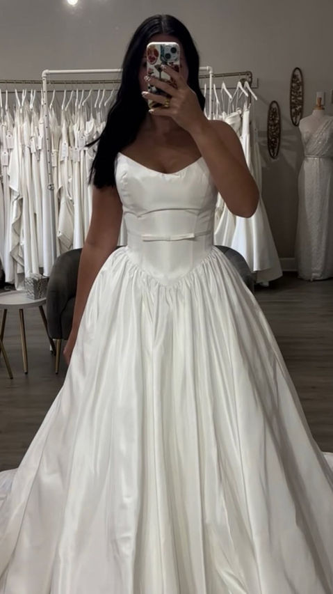 Kirsten by Italia: cat-eye scoop taffeta ballgown wedding dress with detachable bow belt and pockets at Imperial Formal Wear