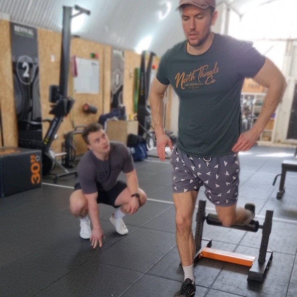 S&C Coach Paul Rose coaching the Bulgarian Split Squat.