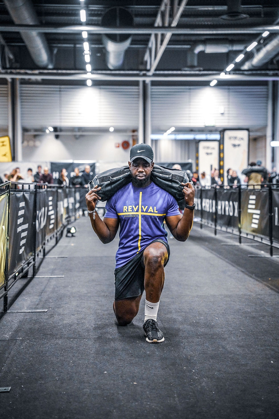 Personal Trainer Shaun Bristol performing the 100m Walking Lunge at HYROX Stockholm.