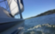 Pretty sailboat on sparkling water