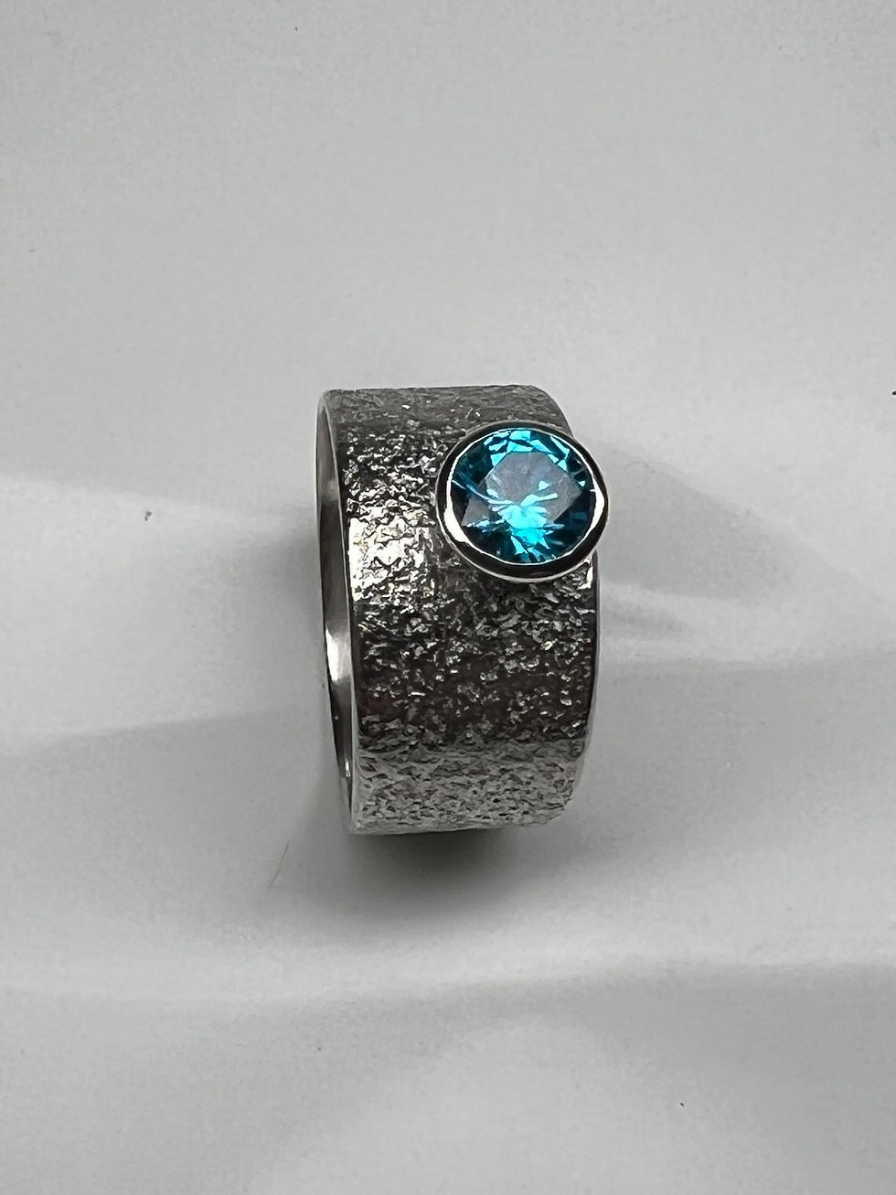 Thumbnail: 925 Sterling Silver and  0.8 carat Aquamarine CZ ‘Broch’ Ring (Size Q.5)