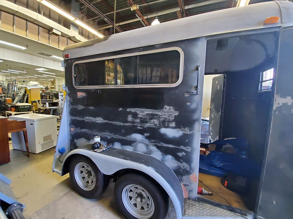 The Traveling Pheasant trailer before the side window is removed