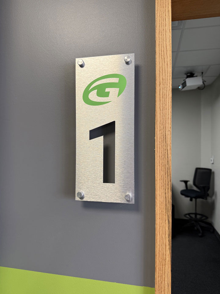 KGM Builders Golftec Golf wall sign closeup image