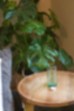 Embossed vintage Coca-Cola glass tumbler in classic green glass with Atlanta GA bottling text