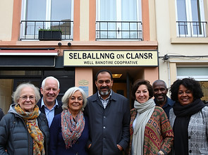 commercial and housing cooperative with european, african and ethnic people in front of th