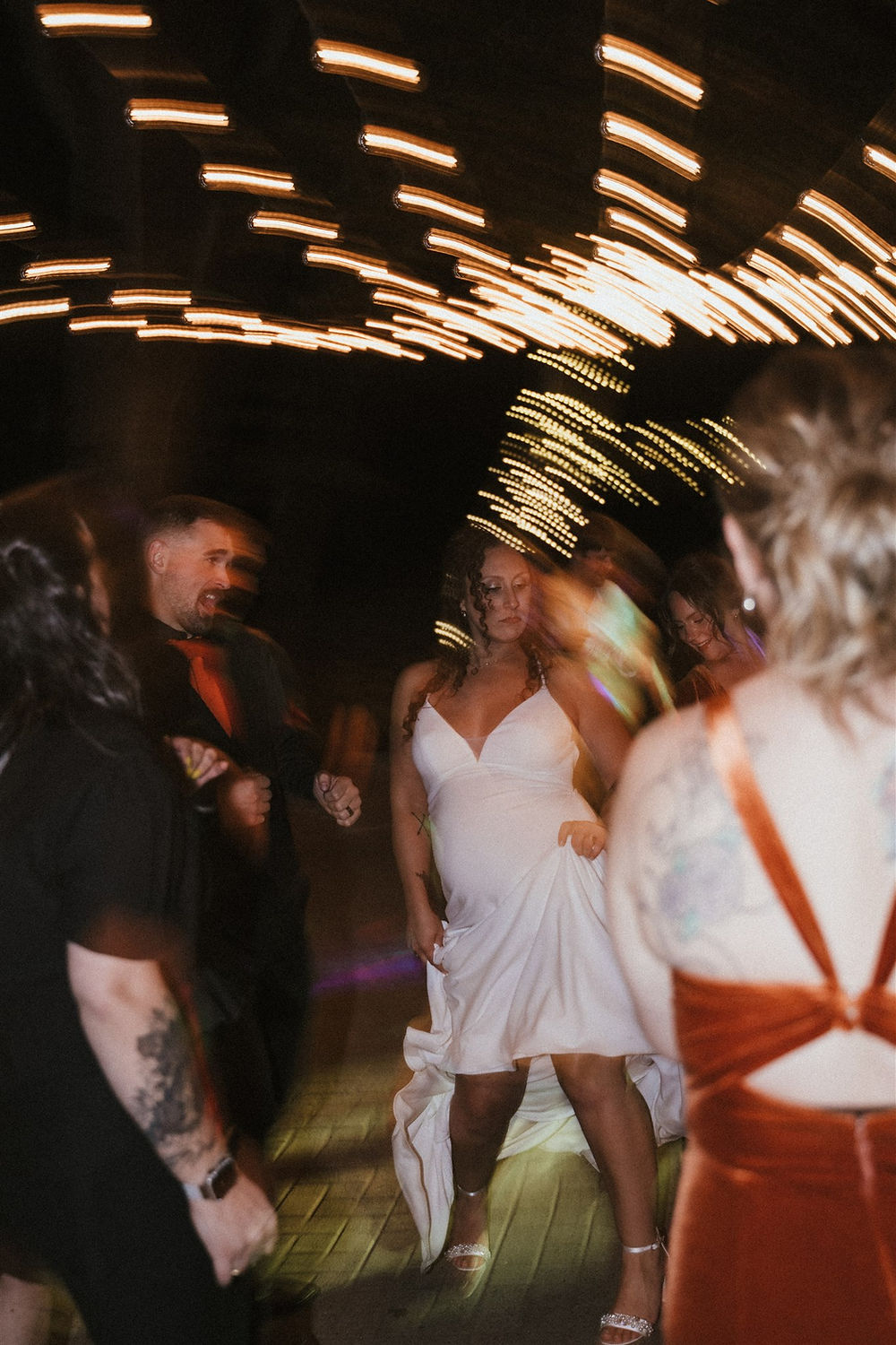 Candid wedding reception photo of bride and groom on dance floor during Eugene, Oregon wedding.