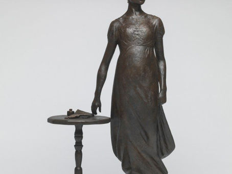 Maquette of Jane Austen near writing table. Sculptor Martin Jennings, photograph courtesy of Steve Russell Studios, 2024.