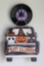 Spooky Records Halloween hanger with two skeletons dancing on "The Boneyard Band" label and decorative front hook