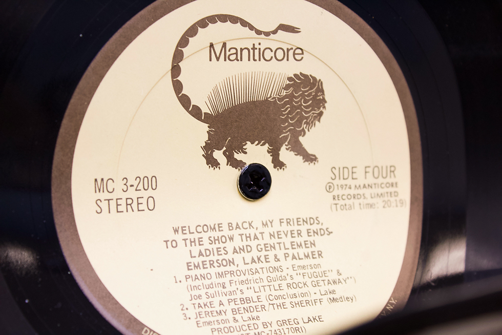 Thumbnail: EMERSON, LAKE & PALMER - warped record holder