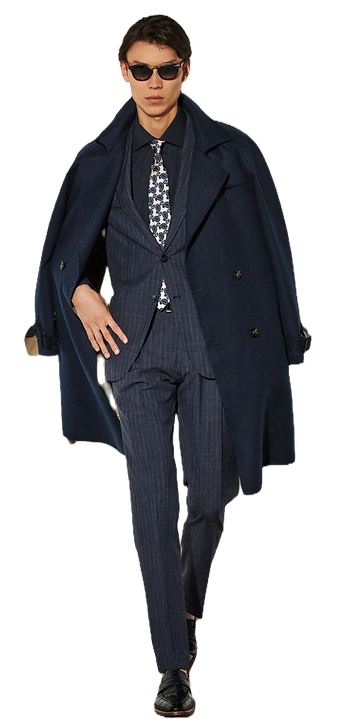 A Kiton blue striped suit and overcoat from the Spring-Summer 2023 collection, showcasing impeccable Italian tailoring and luxurious design.