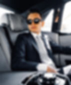 Don't settle for less - keep dreamin' - Aristide Tofani sitting in a Rolls Royce wearing a Tofani suit