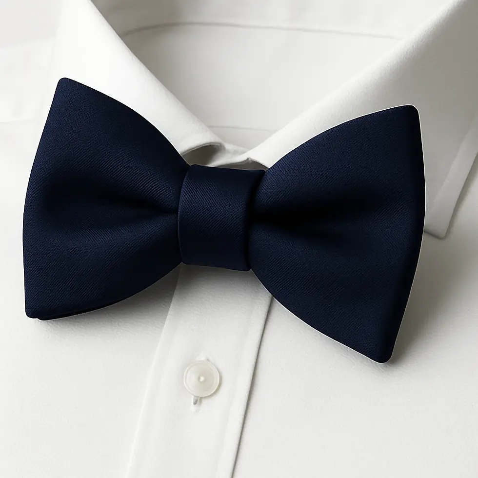 Close-up of theUni-color Navy Blue Satin Como Silk Pre-Tied Bow Tie on a white shirt