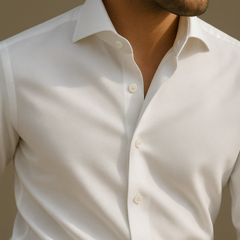 Detail of a luxury men’s shirt fabric in fine Egyptian Giza cotton, showcasing smooth texture, refined weave, and bespoke craftsmanship