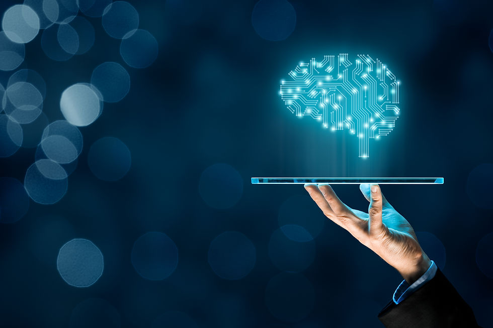 A hand holding a device with a glowing brain