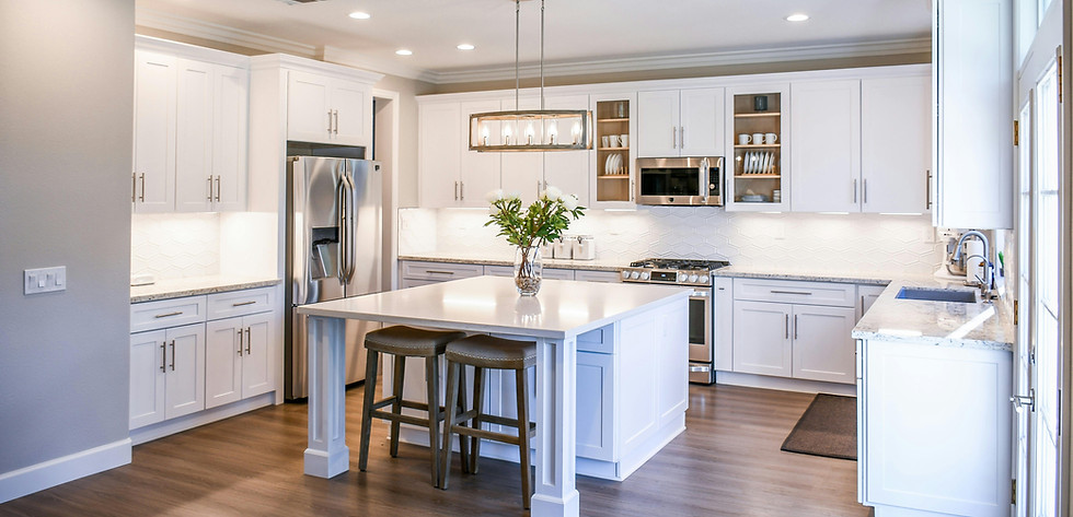 Custom white kitchen remodel with quartz countertops and island Springfield MO