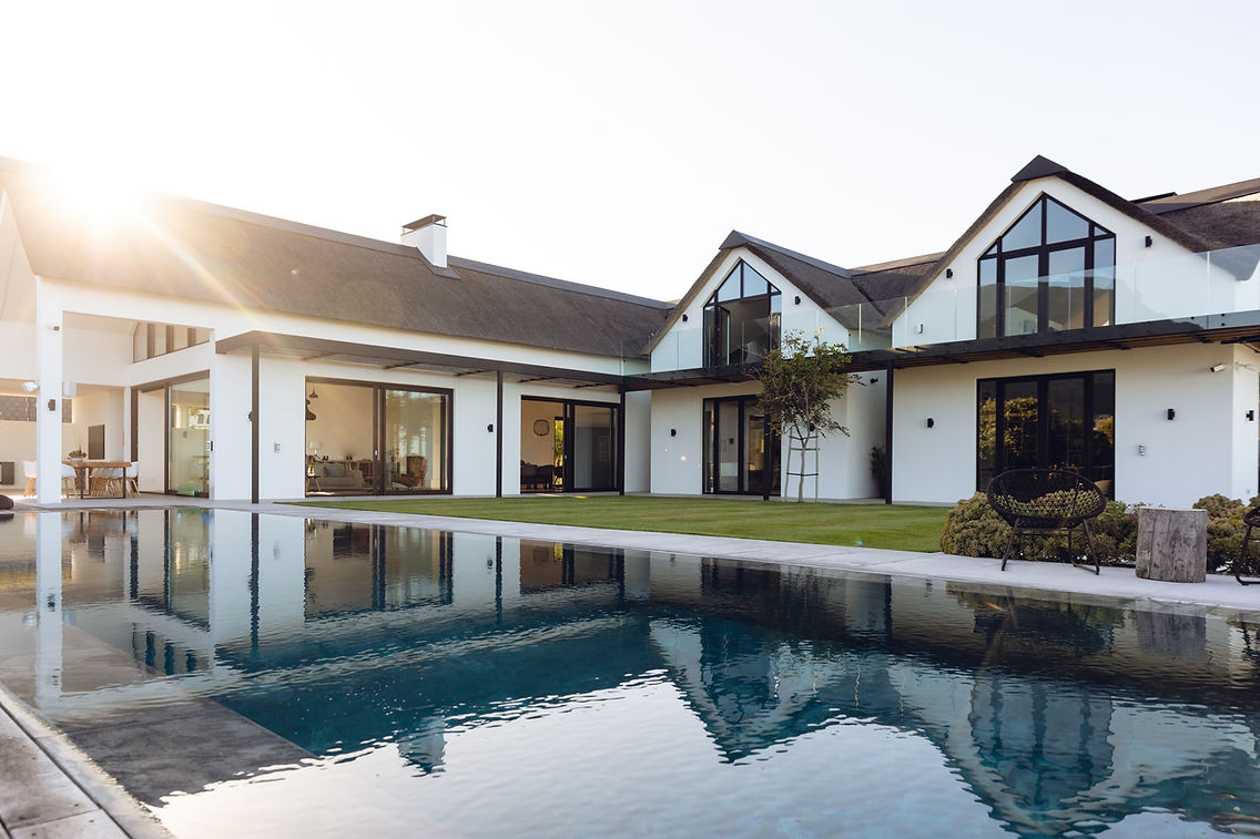 view-of-luxurious-modern-house-exterior-with-garde-2023-11-27-05-08-53-utc.jpg