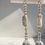 Thumbnail: THE RAINBOW PEARL CLOUD EARRINGS