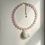 Thumbnail: THE SHELLS NECKLACE IN MILK PINK