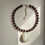 Thumbnail: THE SHELLS NECKLACE IN AUBERGINE