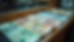 High angle view of a currency exchange booth with various international banknotes
