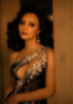 Angela Clark in black beaded outfit, editorial portrait