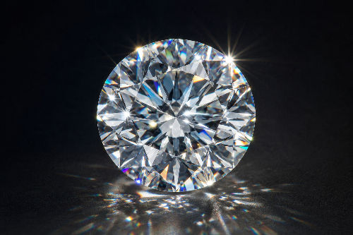 Gemstone isolation photography capturing diamond brilliance fire and scintillation