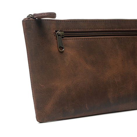Small brown leather pouch with zipper closure highlighting fine stitching and leather texture — gift accessory product photography