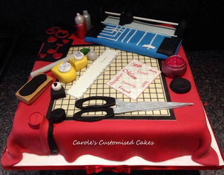 Celebration cake for a card maker features equipment including scissors and guillotine