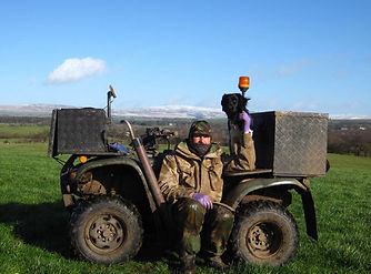 John Noblett mole catcher from Lancashire Mole Control with his mole dog Kike