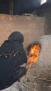 woman from Zagora who bakes bread in an earthen oven