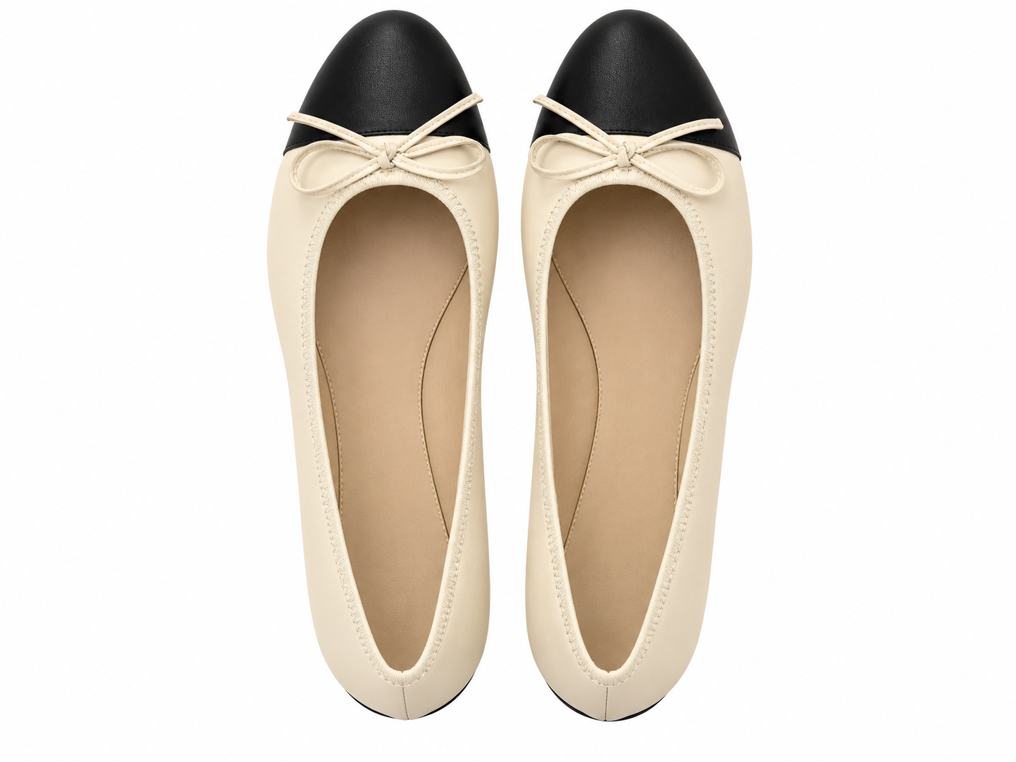 Top view of contrast toe ballet flats in cream and black.