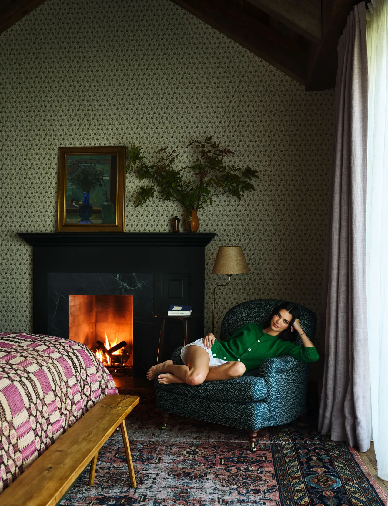 Layered patterns, rich colors, vintage energy. Think Kendall Jenner’s mountain house—collected, cozy, and cool. Slide 3