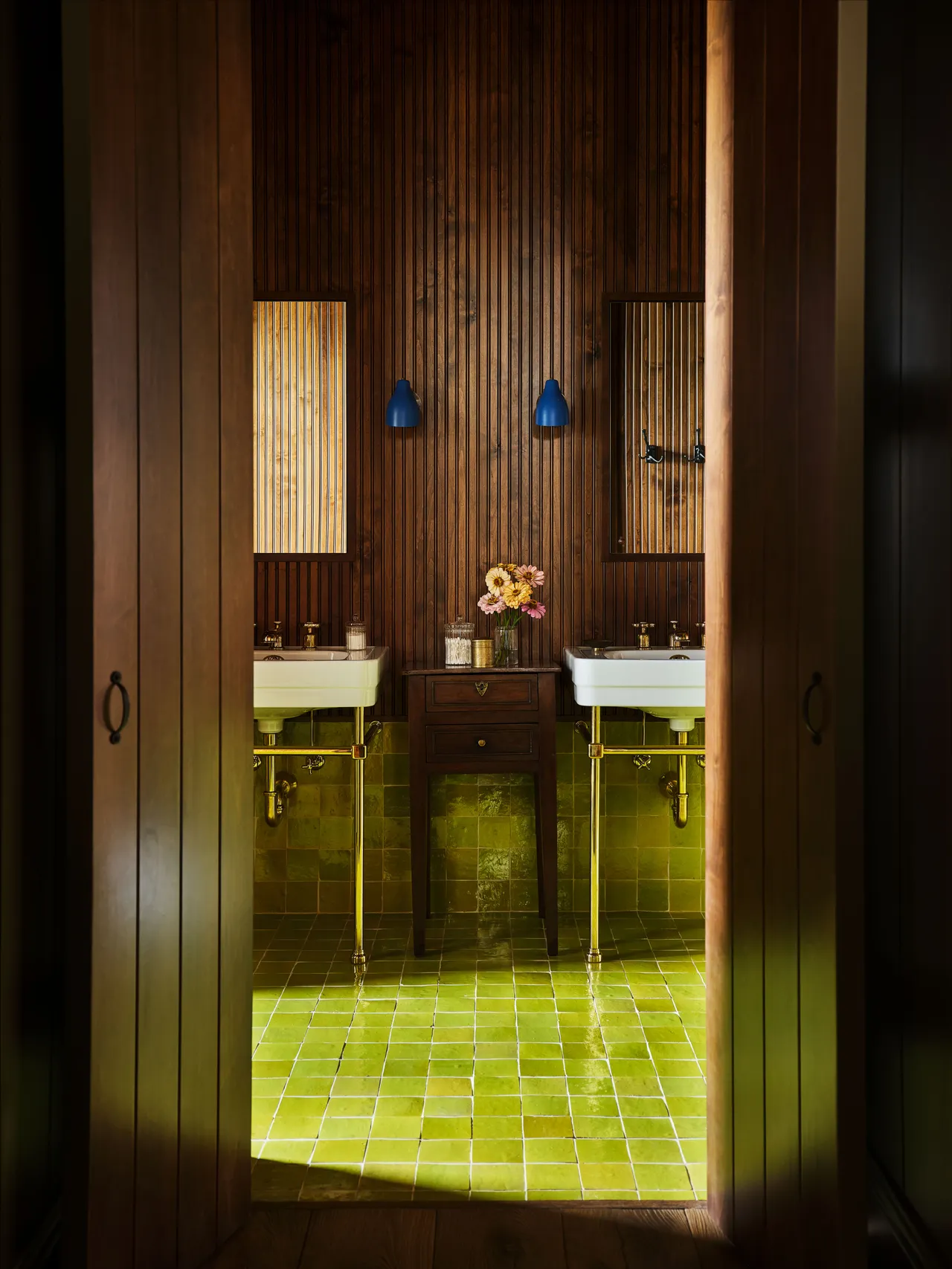 Layered patterns, rich colors, vintage energy. Think Kendall Jenner’s mountain house—collected, cozy, and cool. Slide 3