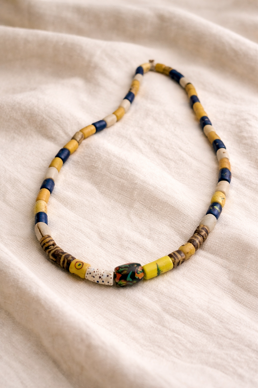 handmade carved stone necklace earthy tones minimalist jewelry