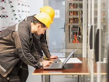 depositphotos_181608242-stock-photo-two-maintenance-engineers-inspect-relay.jpg
