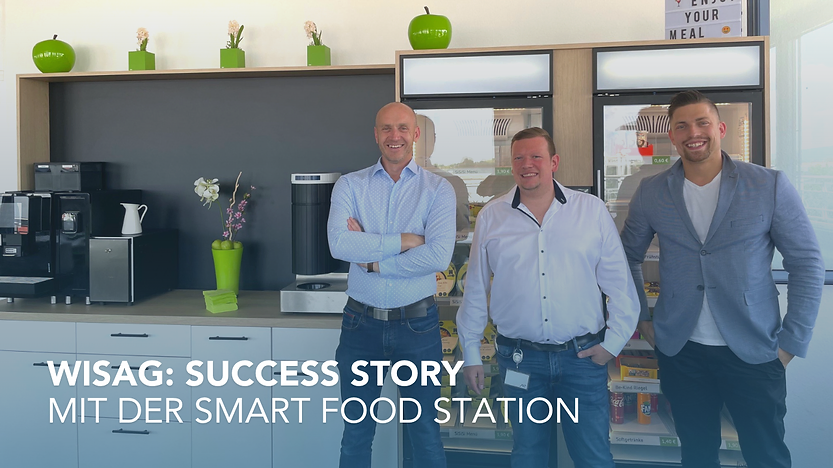 WISAG Mitarebiter stehen vor einer Livello Food Station
