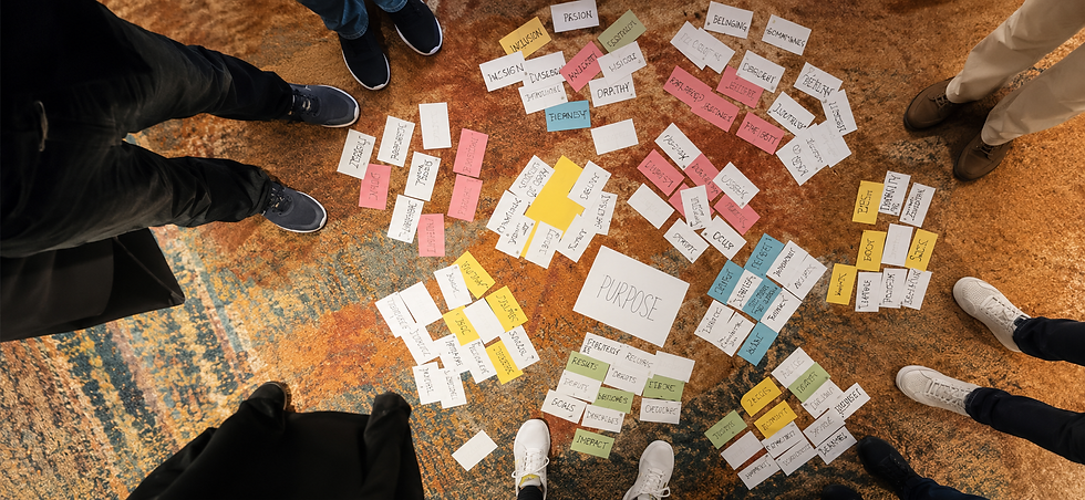 Collaborative brainstorming session with sticky notes.png