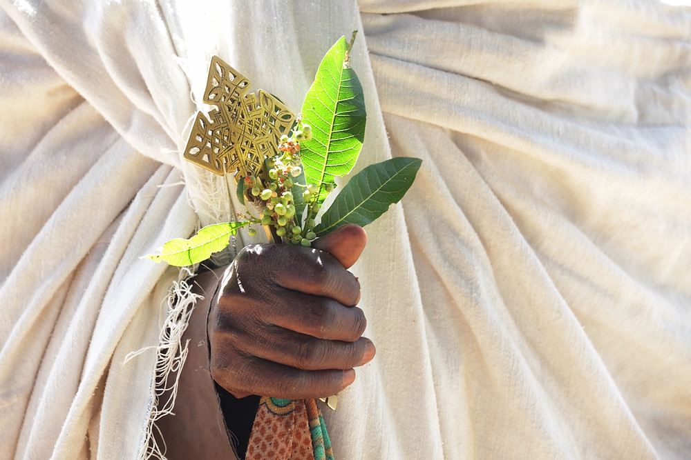 Ethiopian Orthodox priest holds a cross